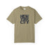 Beige t-shirt with 'New York City' text on a white background