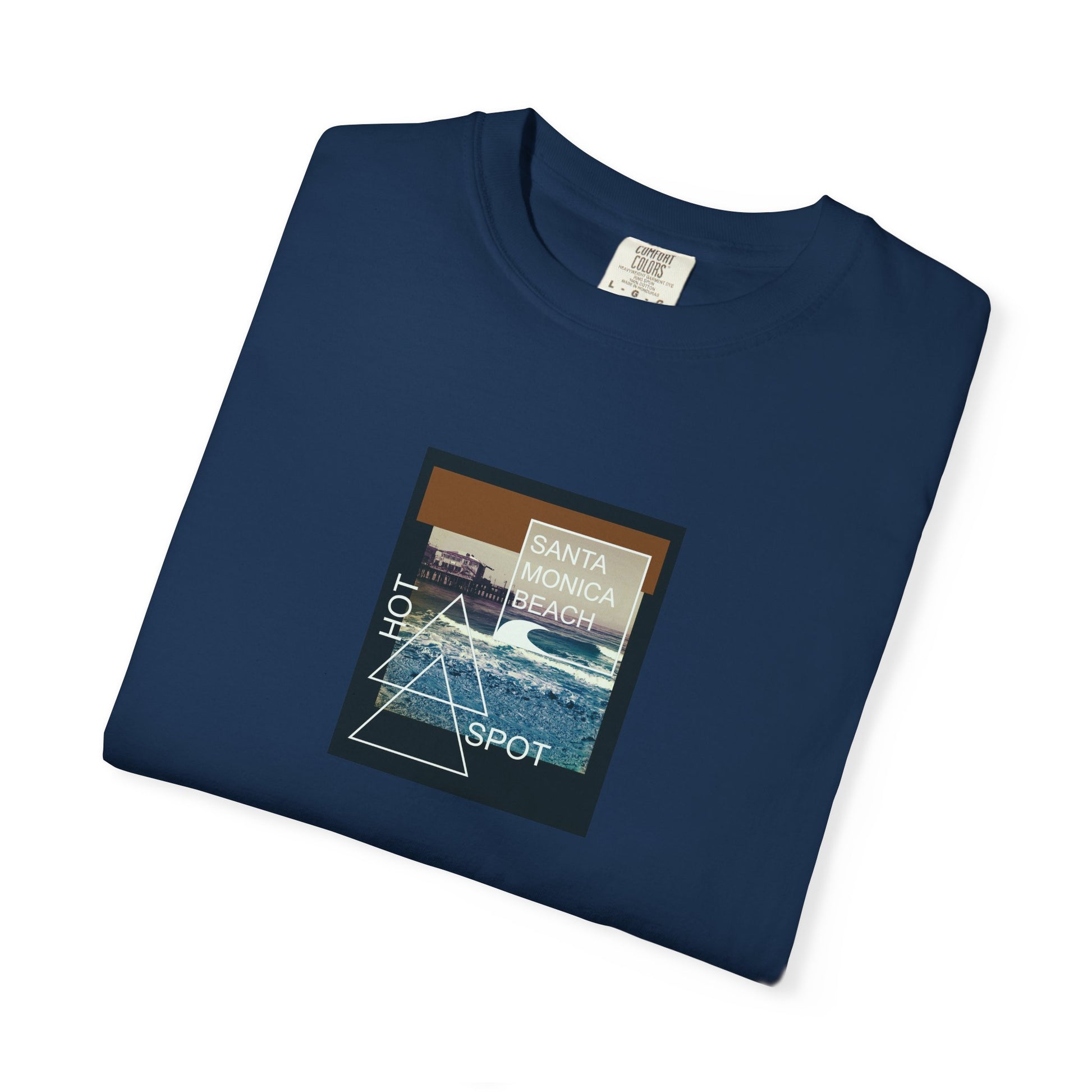 Folded navy blue t-shirt with a graphic design on a white background