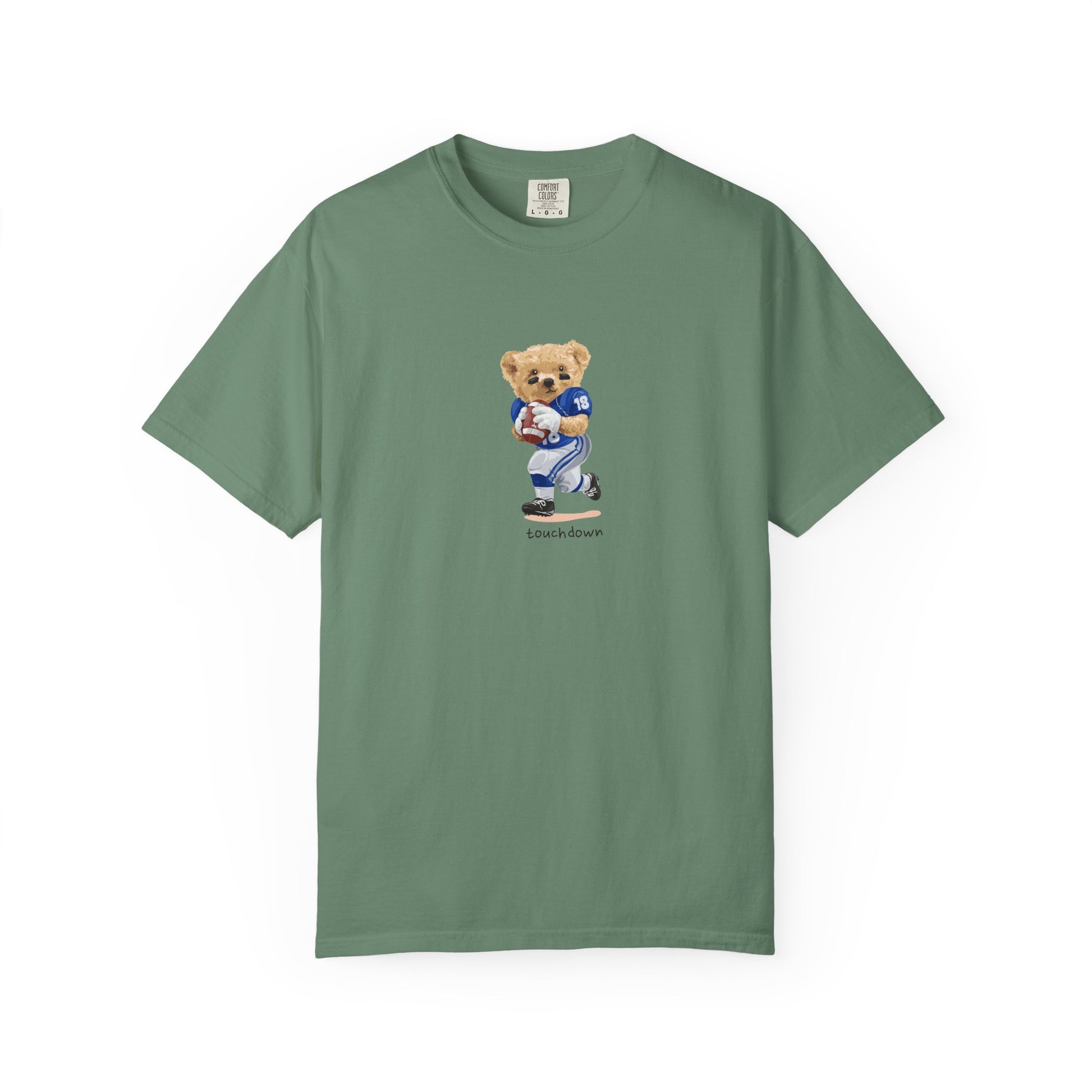 Green t-shirt with a bear graphic holding a football on a white background