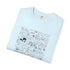 A light blue folded crewneck t-shirt featuring a detailed occult-style graphic print on the front with various symbols, handwritten script, and illustrations.