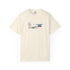 Beige t-shirt with a graphic of two people on a beach and a flower.