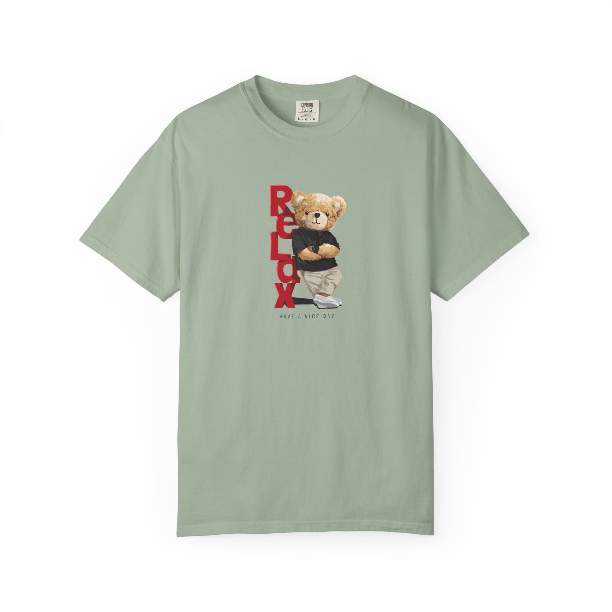 Green t-shirt with a teddy bear graphic and text on a white background