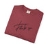 Folded red t-shirt with a thanks graphic 