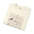 An off-white folded crewneck t-shirt featuring a detailed occult-style graphic print with cursive script, symbols, and illustrations in muted red and brown tones.