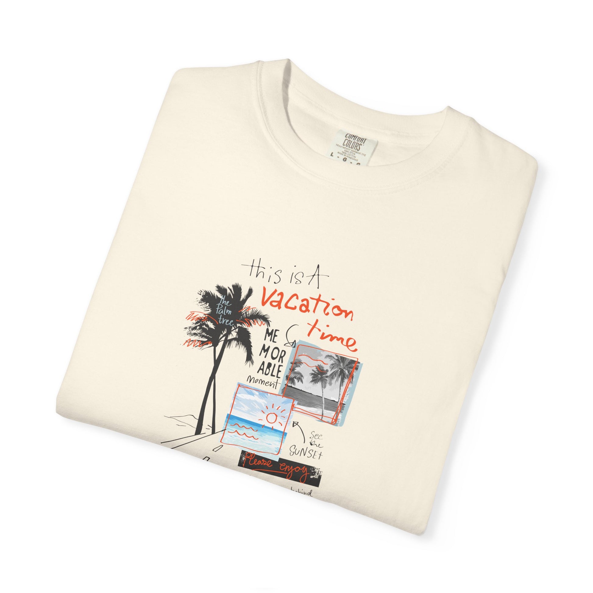 Folded cream-colored t-shirt with a colorful graphic design on a white background