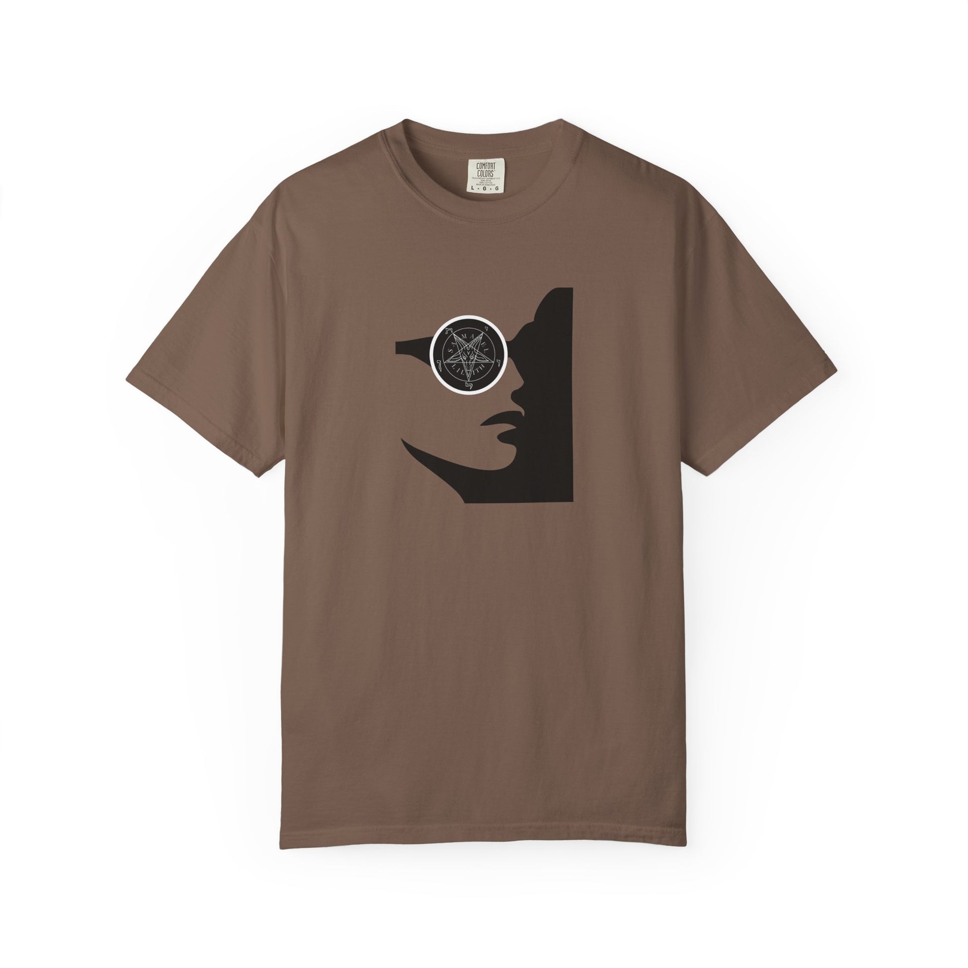 A brown short-sleeve crewneck t-shirt featuring a black graphic of a face wearing a circular pentagram design on the chest, displayed against a solid white background.