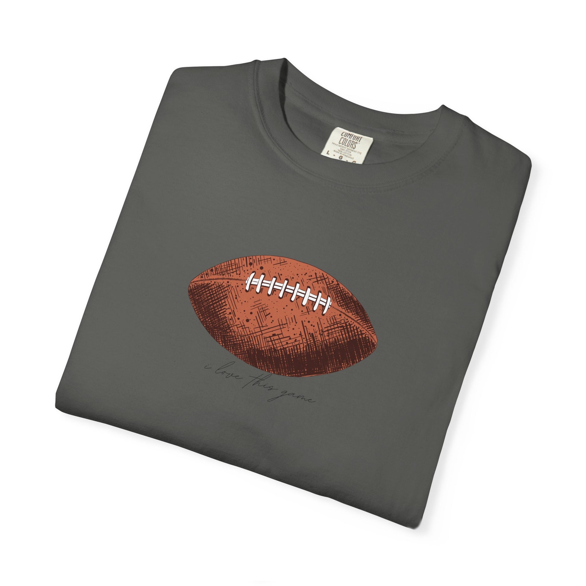 Folded gray t-shirt with a brown football graphic on a white background