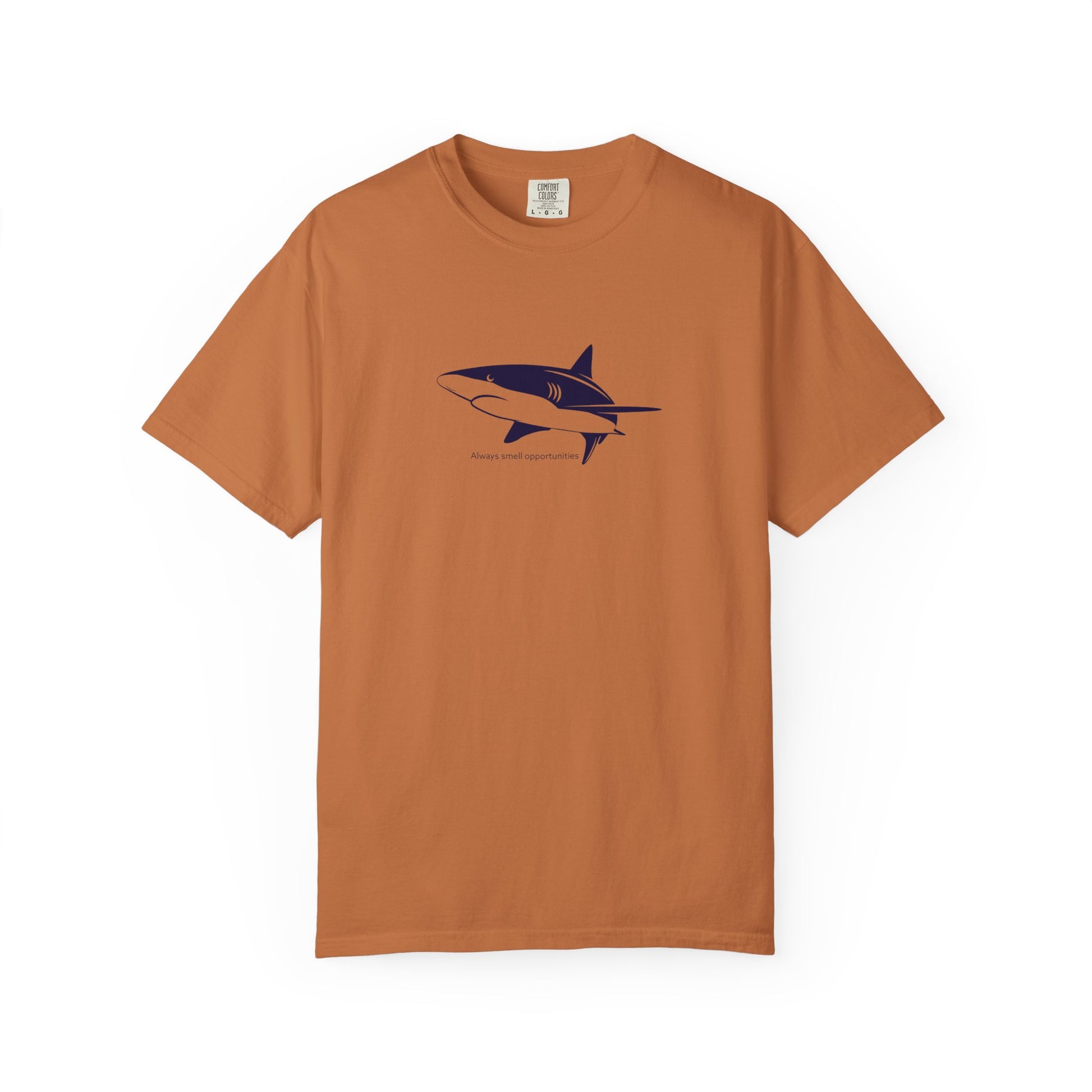 Brown t-shirt with a shark graphic on a white background
