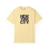 Yellow t-shirt with 'New York City' text on a white background