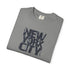 Folded gray t-shirt with 'New York City' text on a white background
