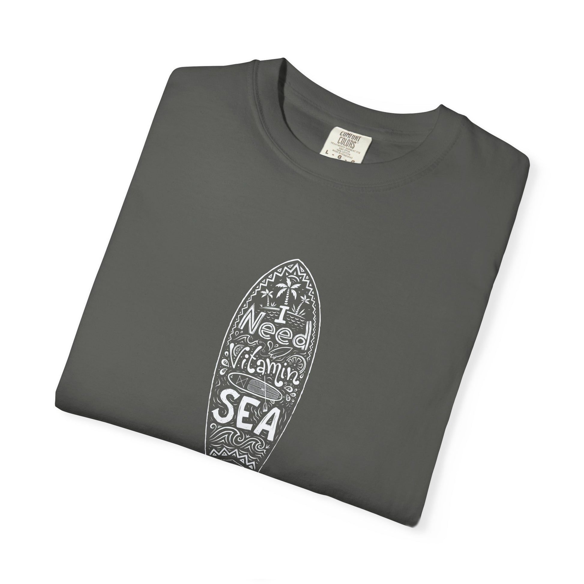 Folded gray t-shirt with a graphic of a person wearing overalls on a white background