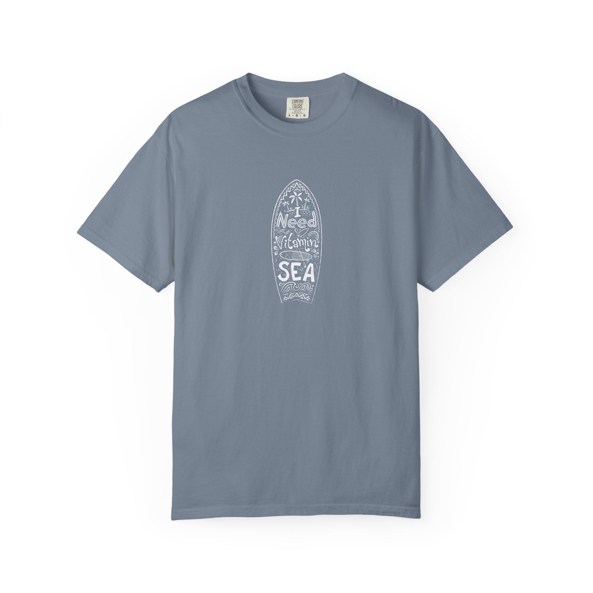 Teal t-shirt with a white cross and roots design on a white background