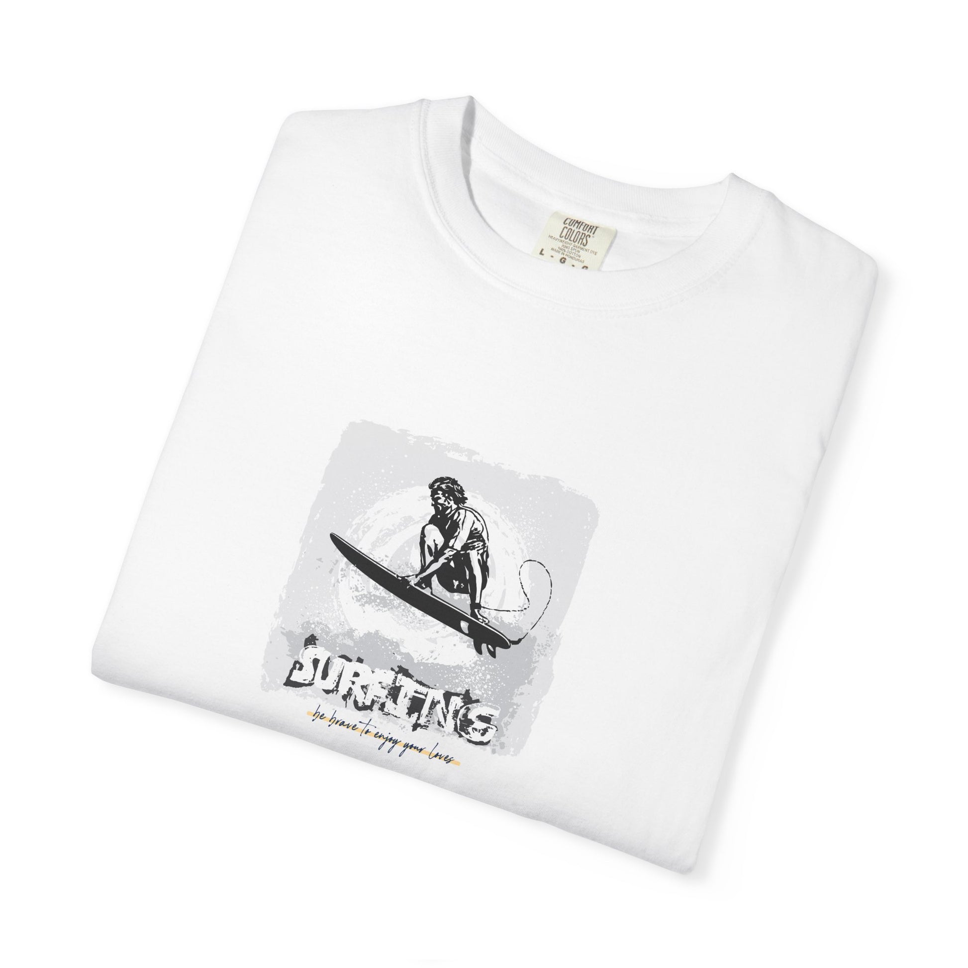 White t-shirt with a graphic of a person on a surfboard and the text 'Burning Man' on a white background.