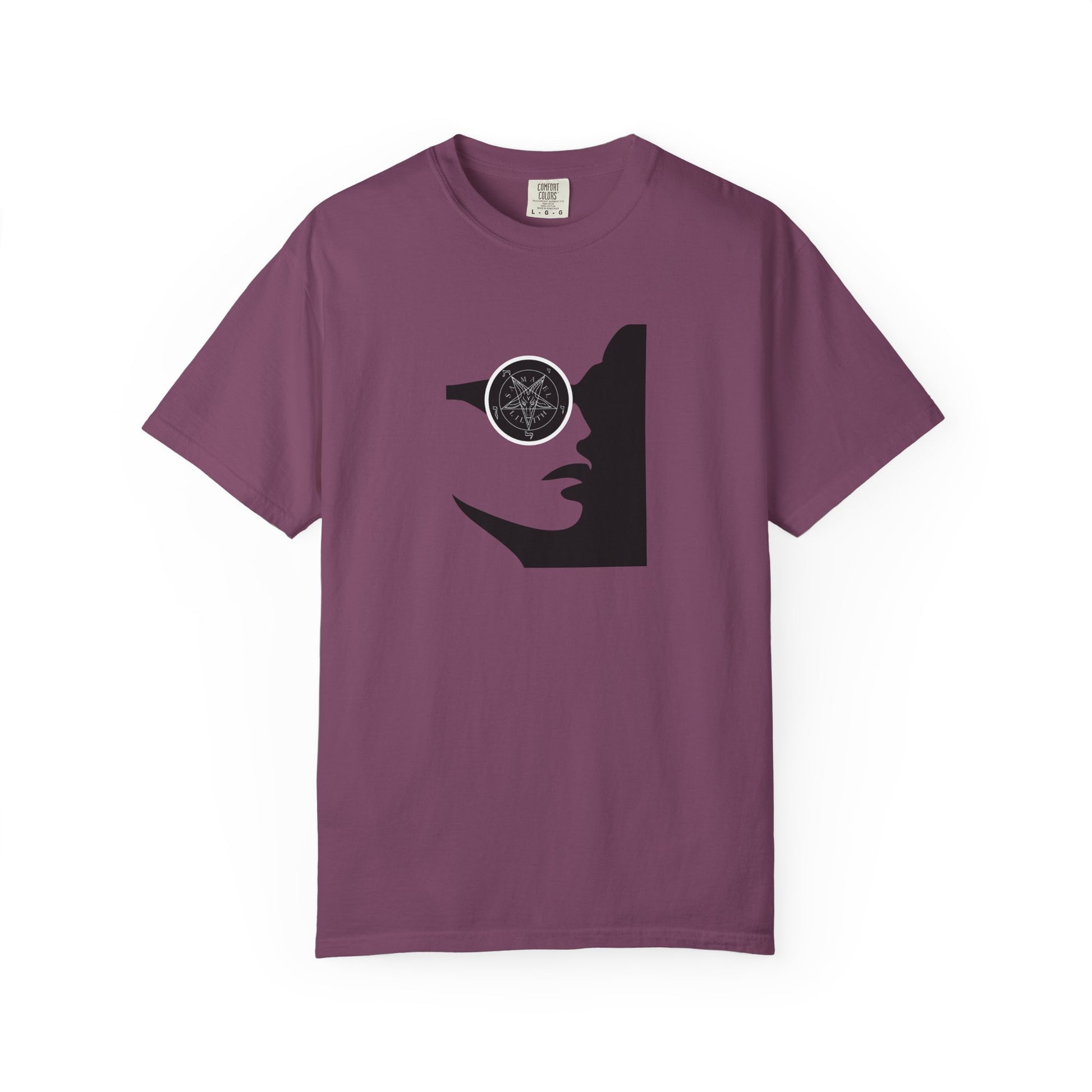 A short-sleeve crewneck t-shirt in a muted plum purple color, featuring a black graphic print of a woman's profile with a pentagram symbol in her eye.