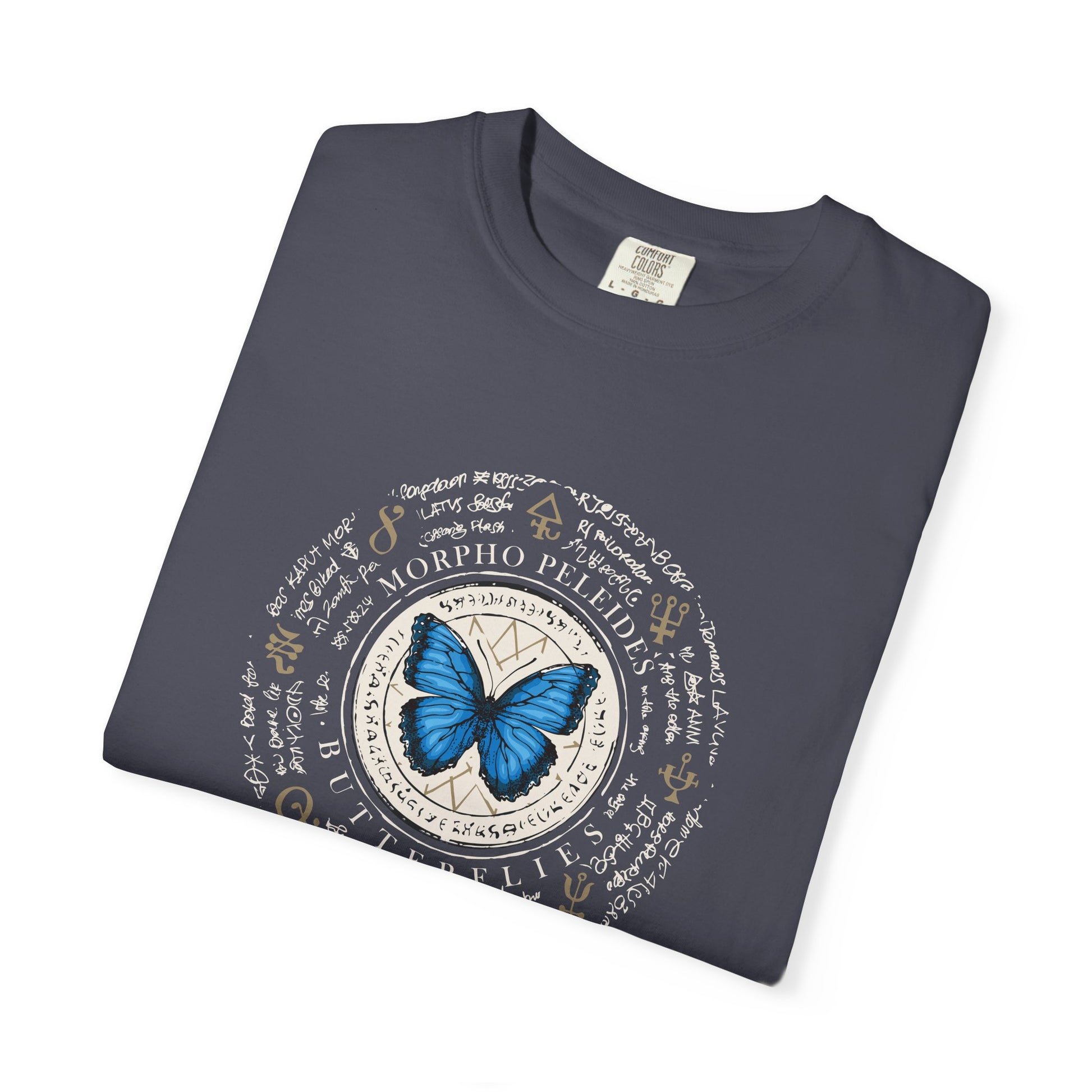 Folded red t-shirt with 'Cannibal' graphic design on a white background