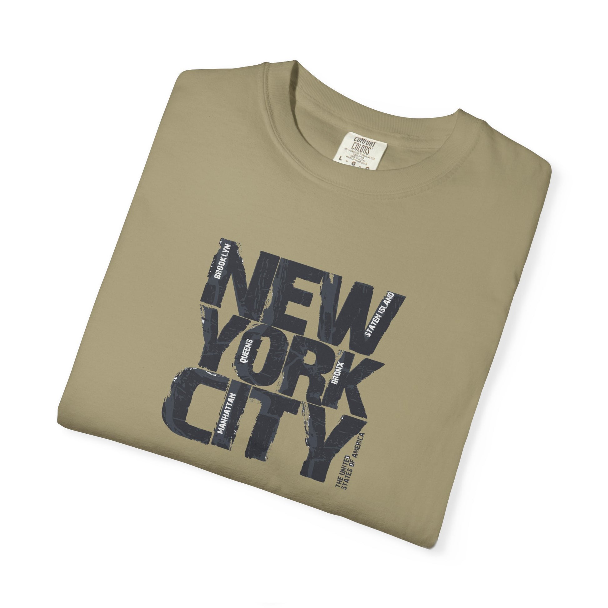 Folded khaki t-shirt with 'New York City' text on a white background