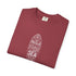A folded dusty rose crewneck t-shirt with a white surfboard graphic containing the words 'I Weed Vitamins SEA' on a clean white background.
