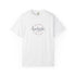 White t-shirt with text 'Life's a beach. Enjoy the waves.' on a white background