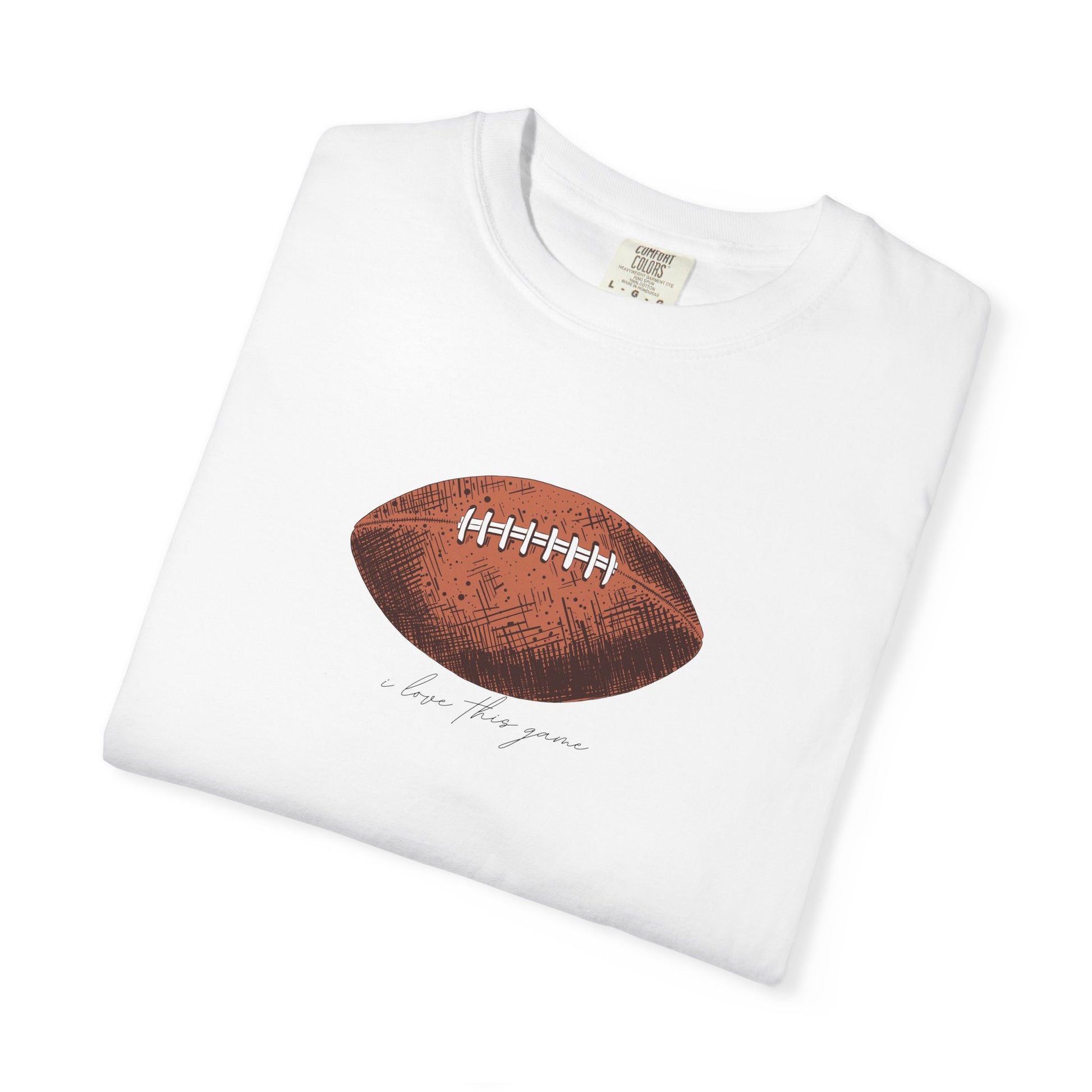 White t-shirt with a brown football graphic and text on a white background
