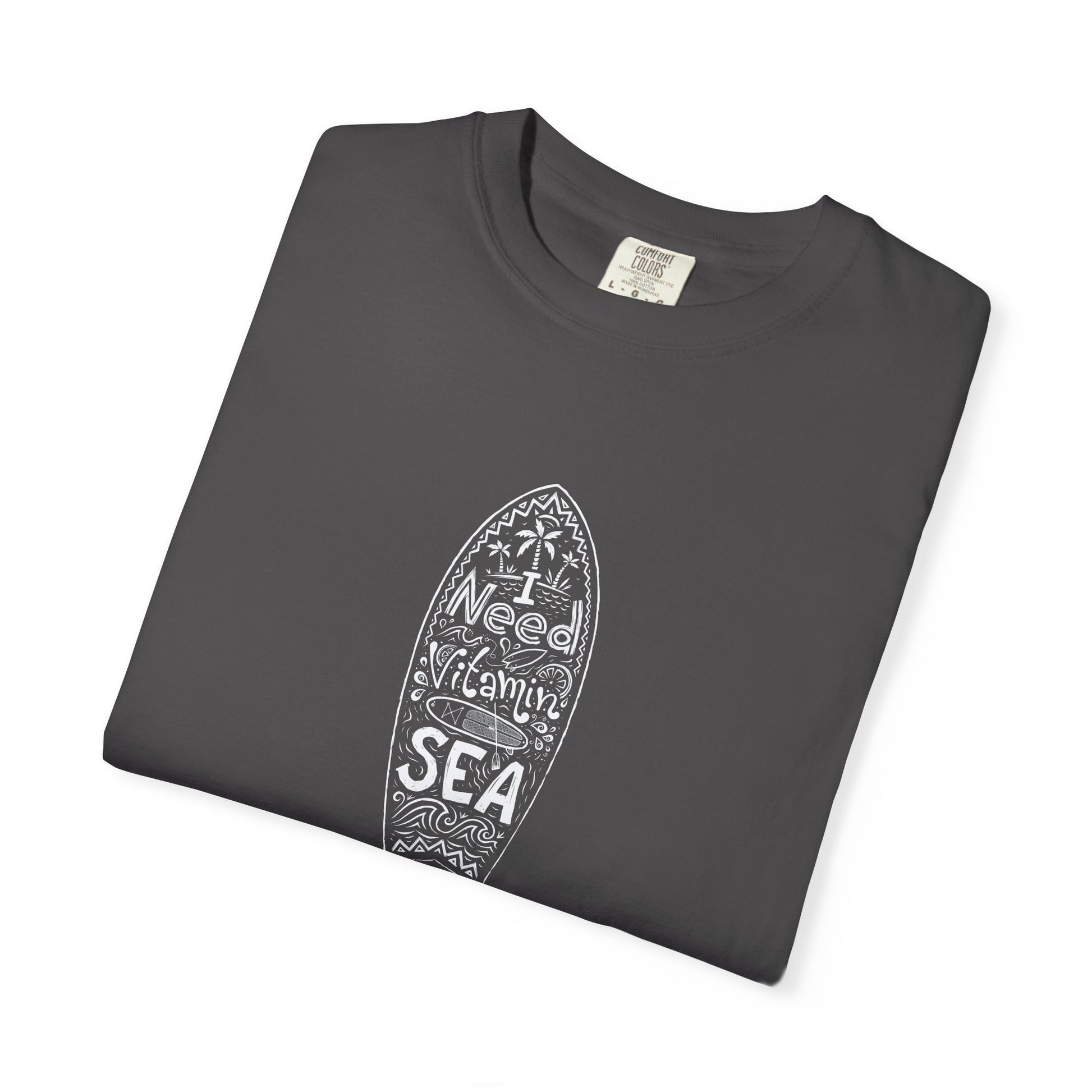 Folded gray t-shirt with a graphic of a person wearing overalls on a white background