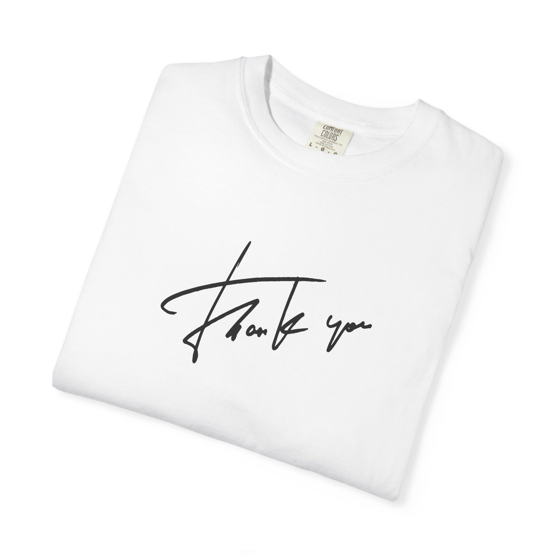 A folded white crewneck t-shirt with a black cursive 'Thank you' script printed on the front, displayed on a clean white background.