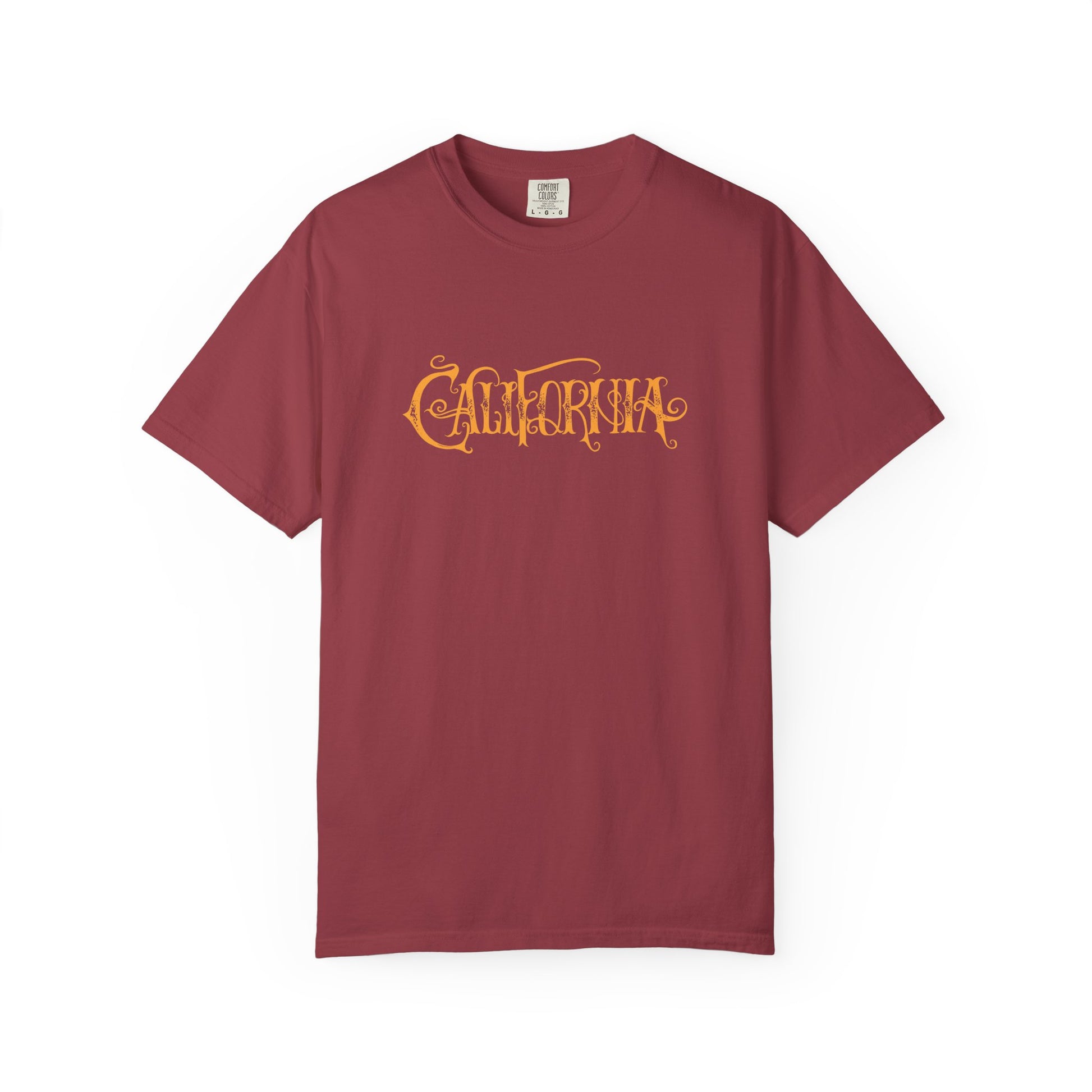 A maroon short-sleeve crewneck t-shirt featuring the word 'CALIFORNIA' printed across the chest in a stylized, metallic gold font, displayed against a plain white background.