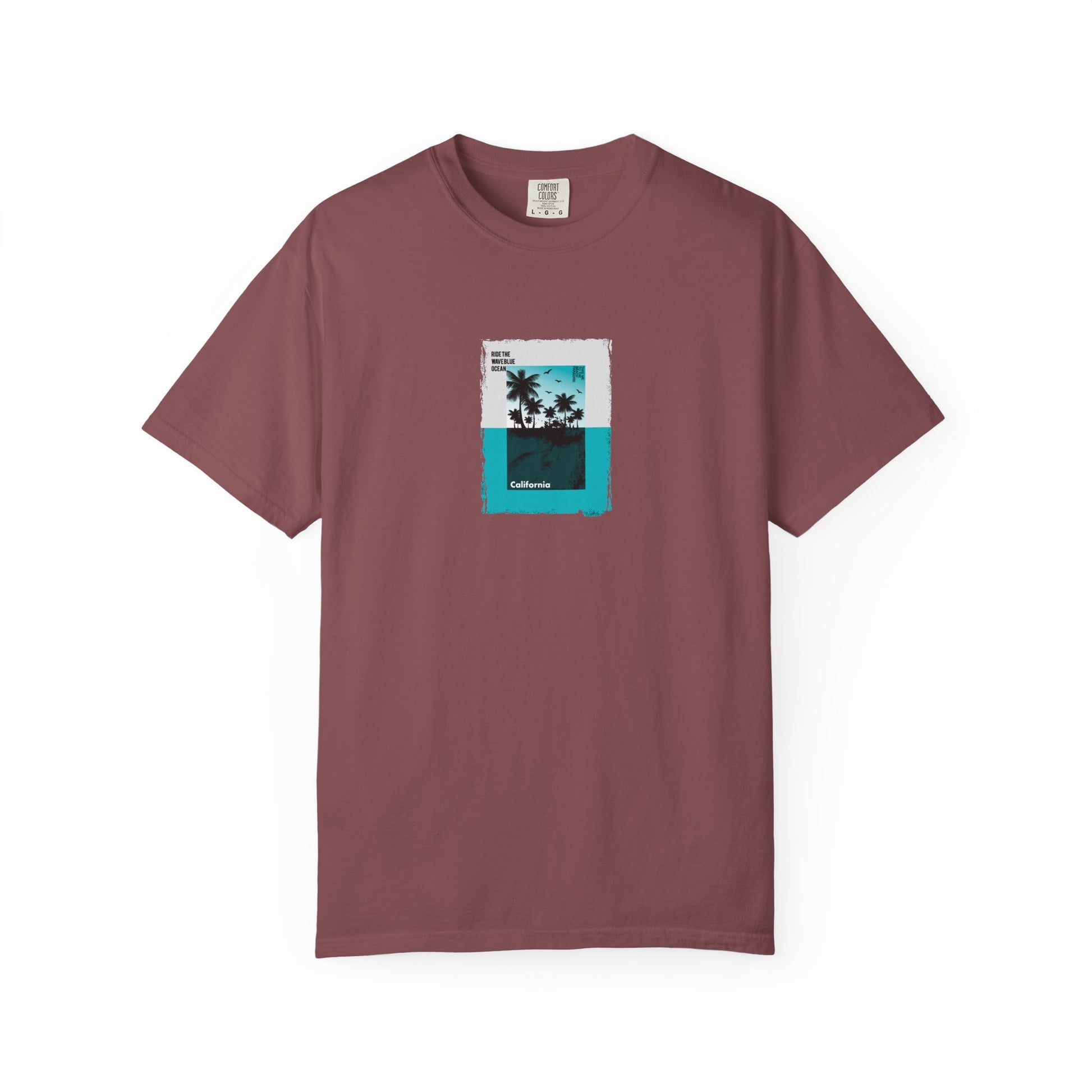 Maroon t-shirt with a tropical graphic on a white background