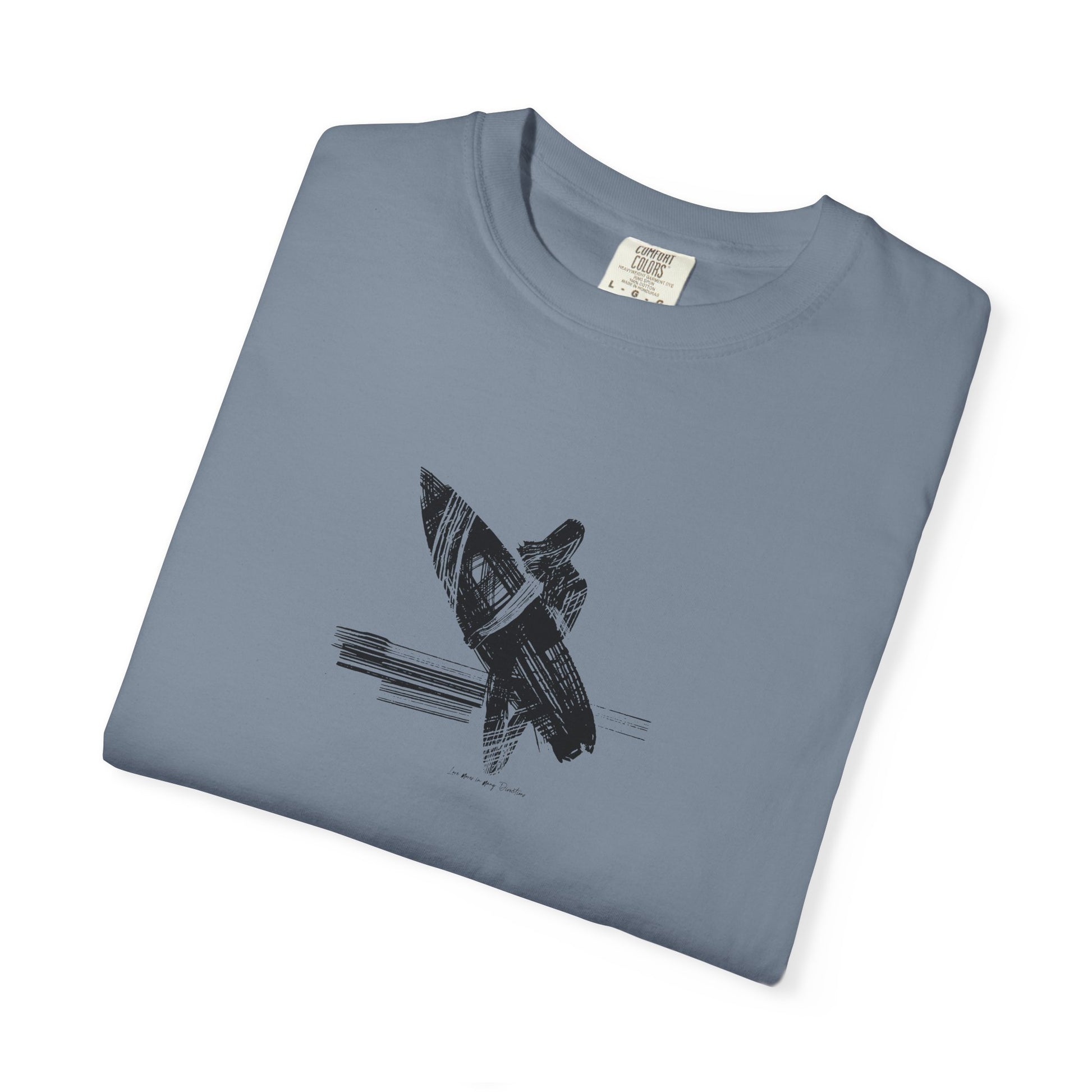 Folded blue t-shirt with a black graphic design on a white background