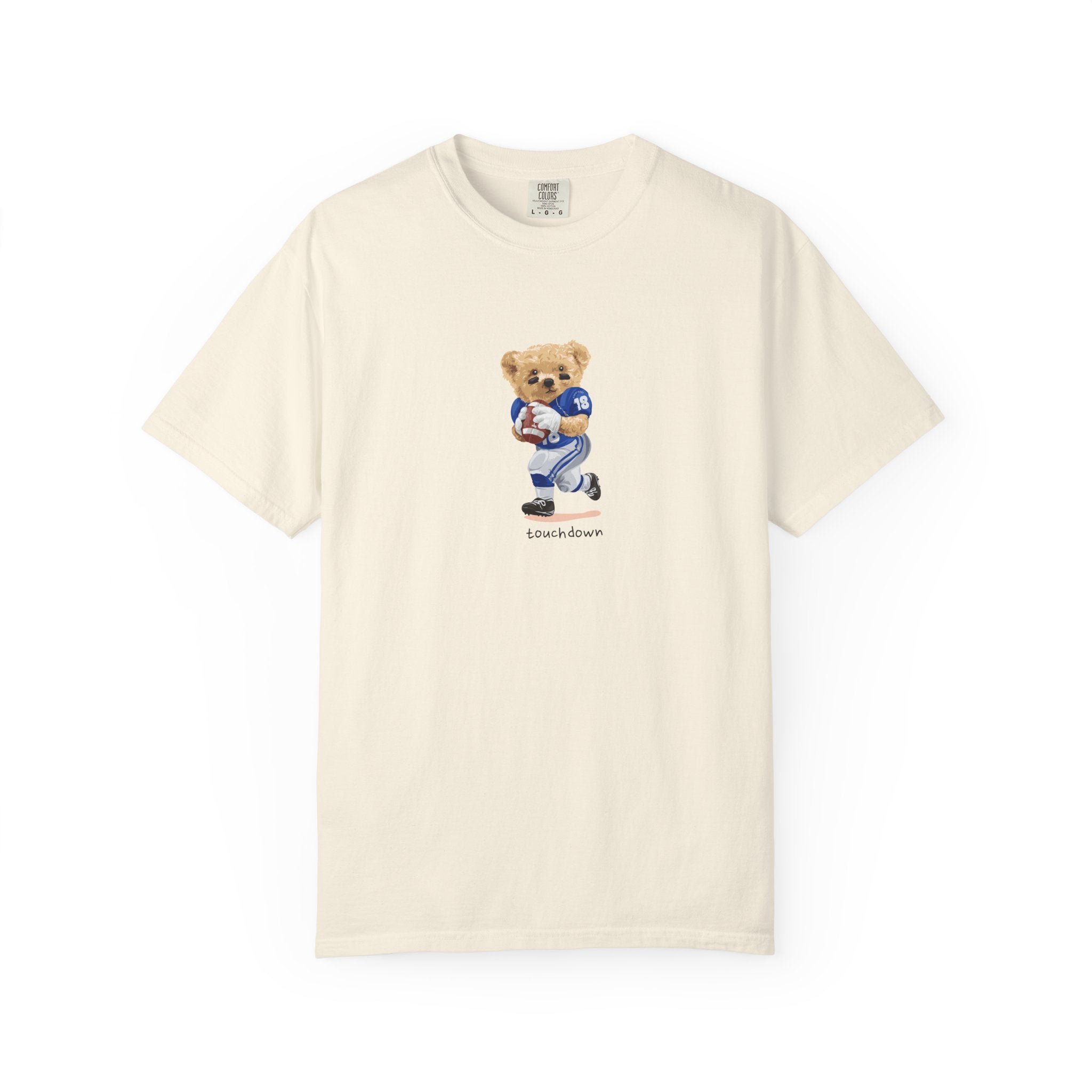 Beige t-shirt with a bear graphic and text 