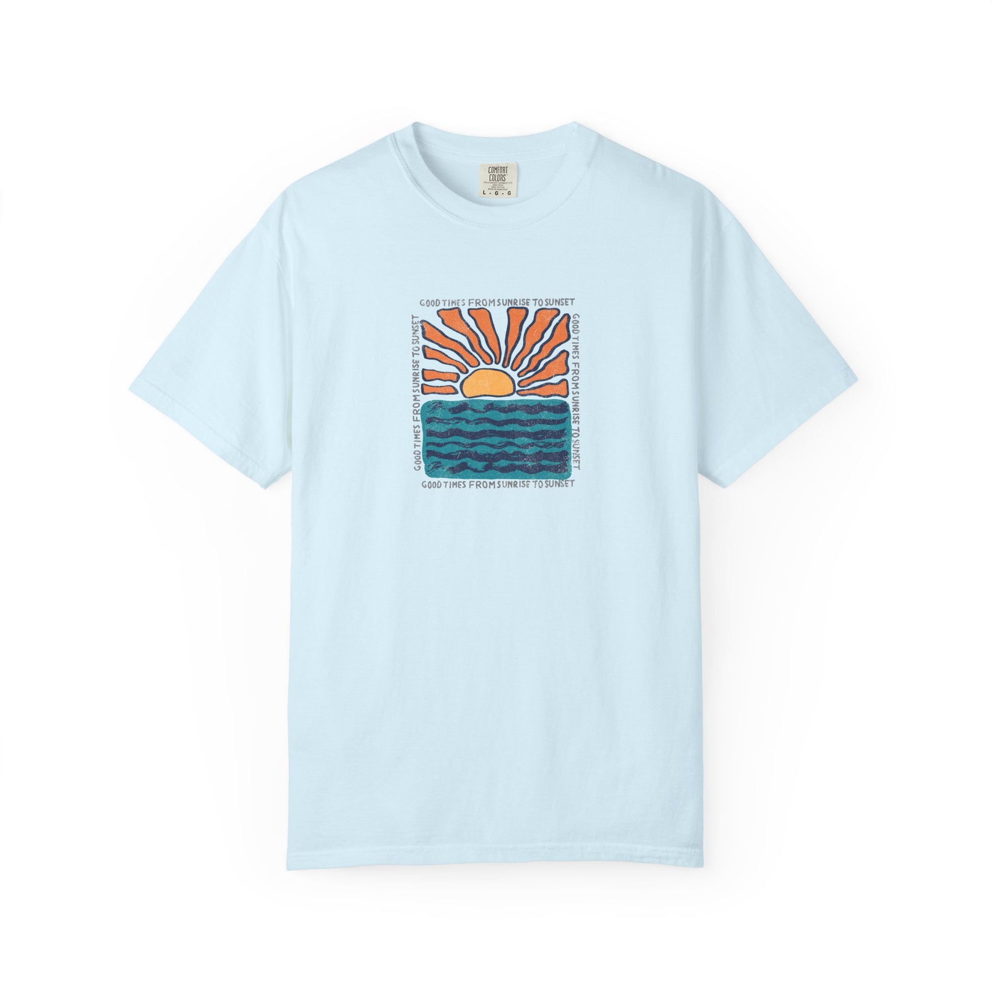 A light blue short-sleeve crewneck t-shirt featuring a central graphic of a sunset over wavy blue-green water, with the text 'I DON'T WANNA BE YOURS' printed around the design.