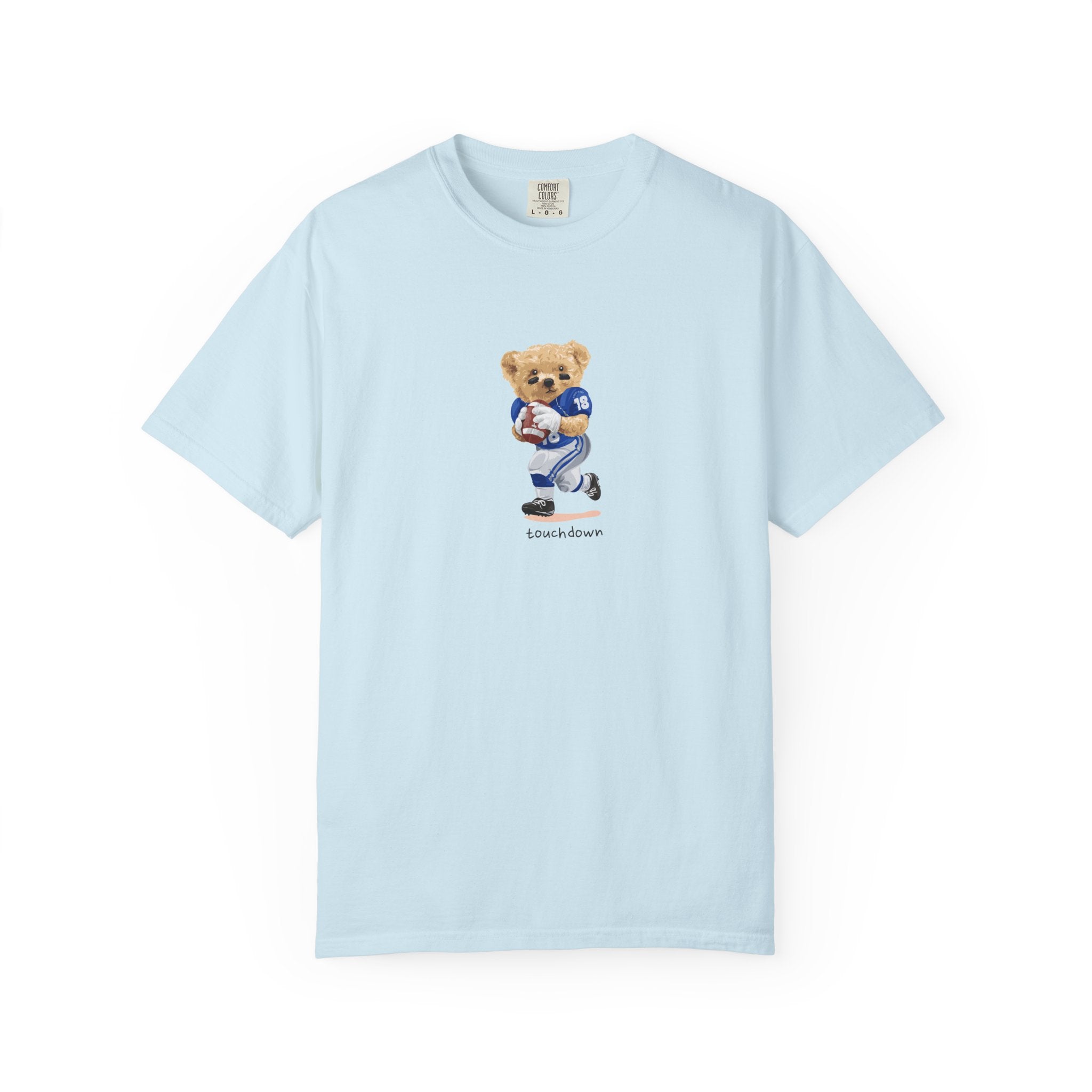 Light blue t-shirt with a teddy bear graphic on a white background