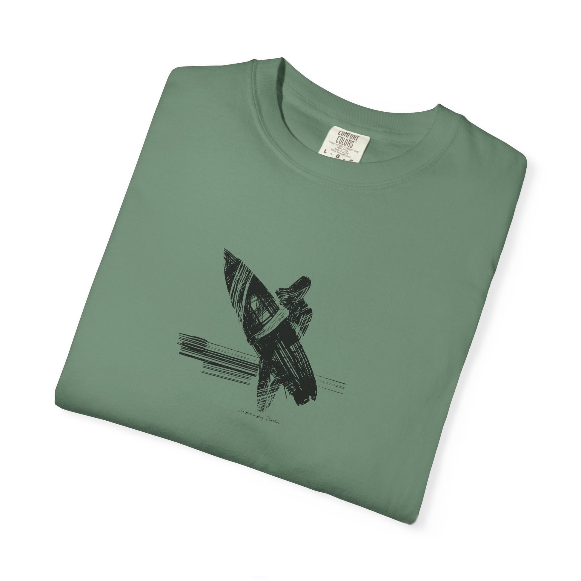 Folded green t-shirt with a black graphic on a white background