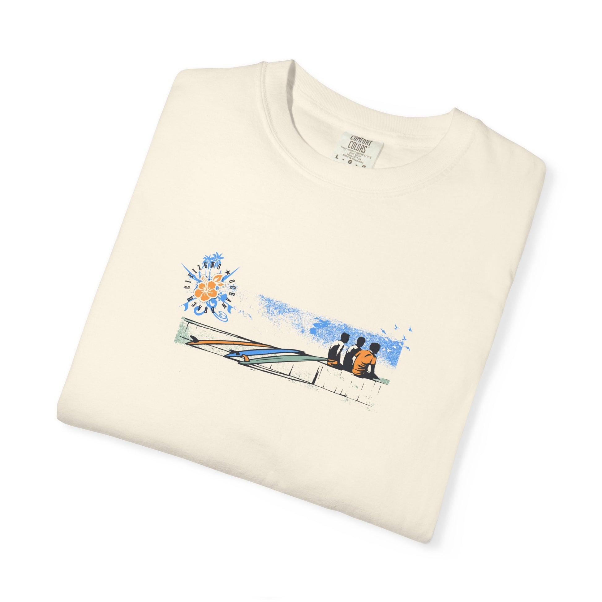 Folded cream t-shirt with graphic design on a white background