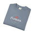 Folded blue t-shirt with 'professional procrastinator' text on a white background