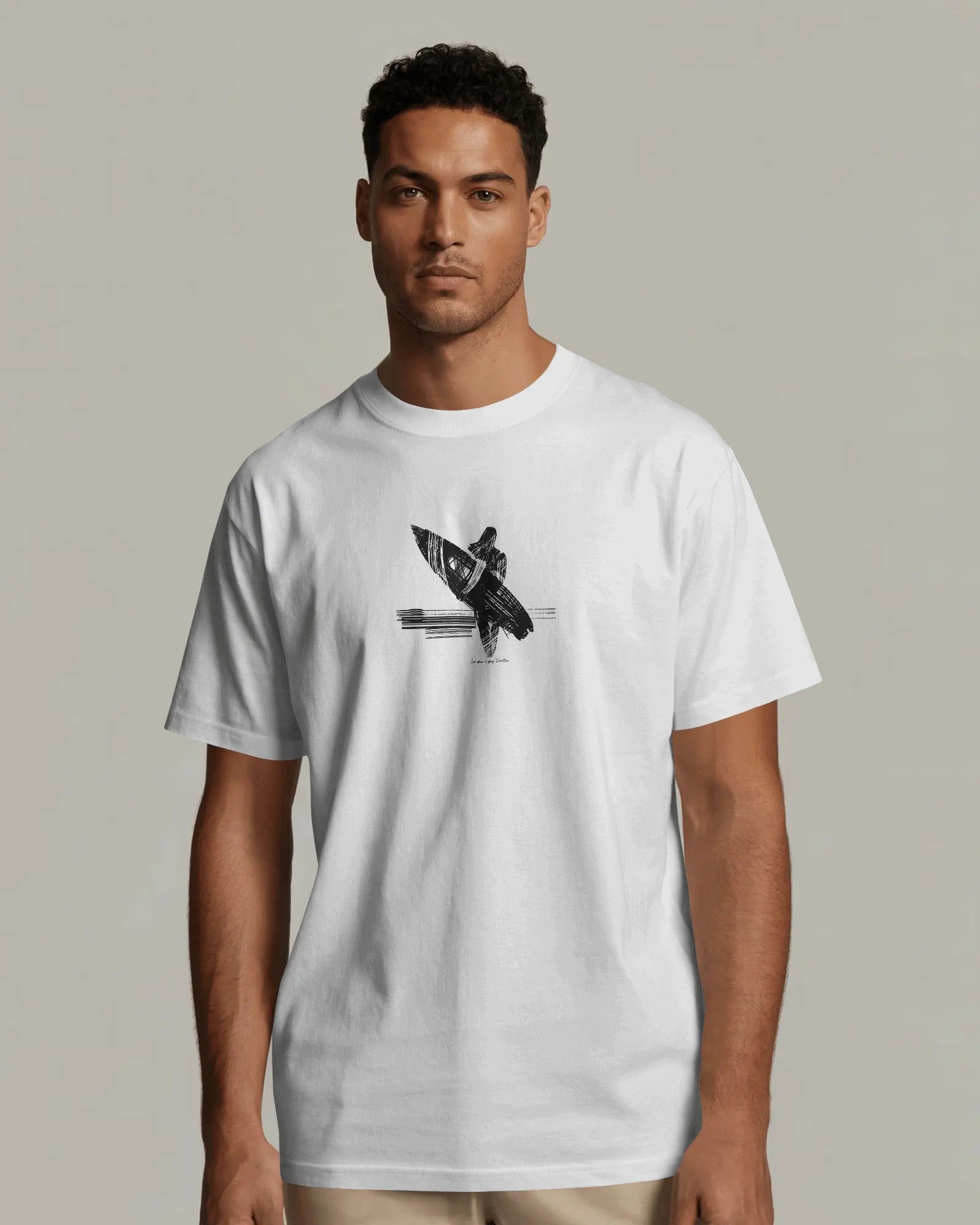 Female model wearing surfer graphic t-shirt with surfboard coastal surf lifestyle design
