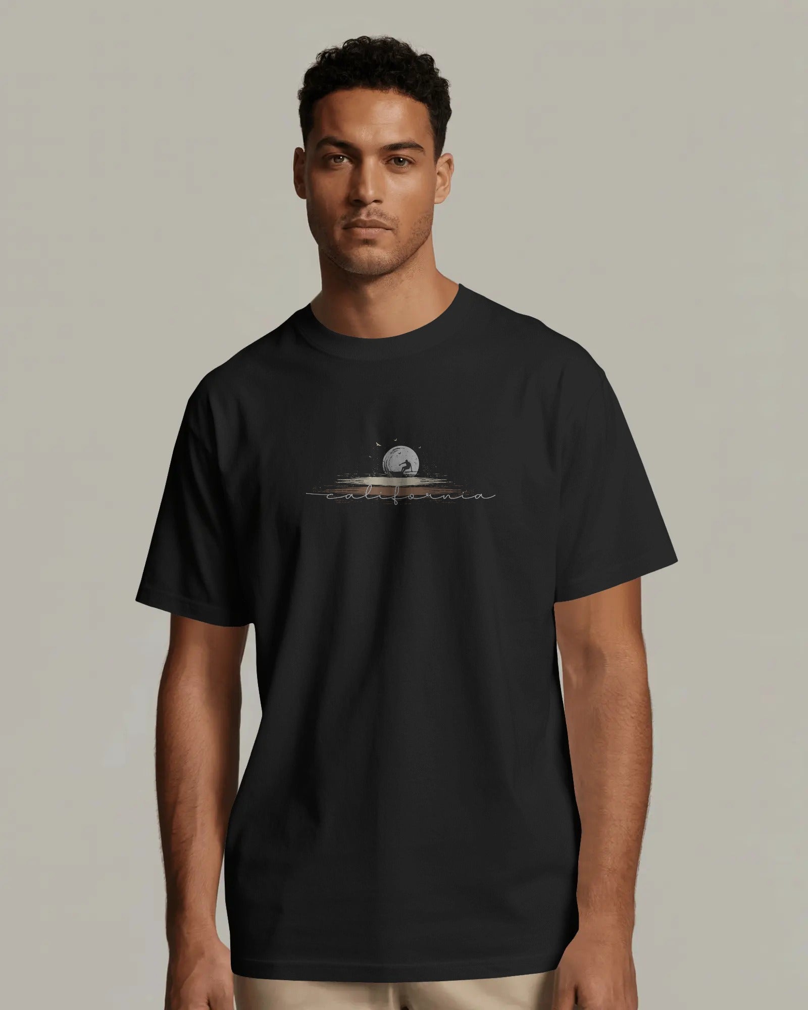 moonlit surf wave graphic t shirt worn by male model